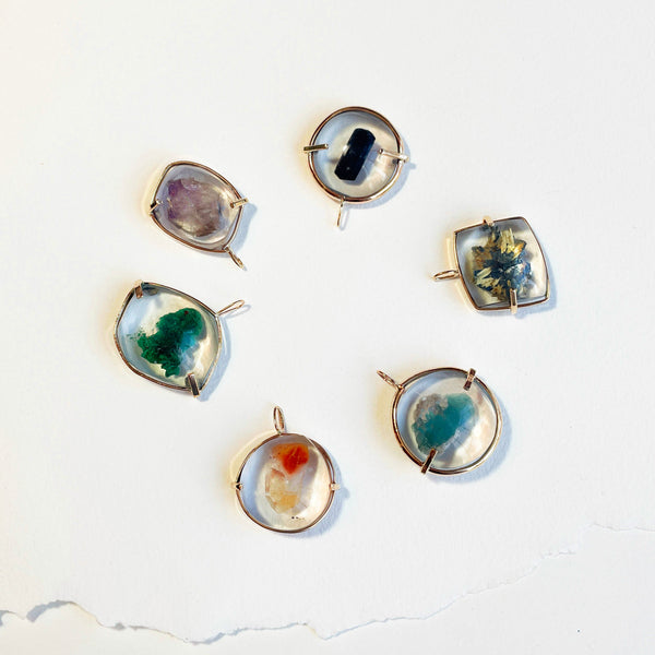 Floating gem and mineral charms